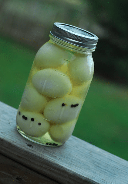 Canned whole eggs in glass jar