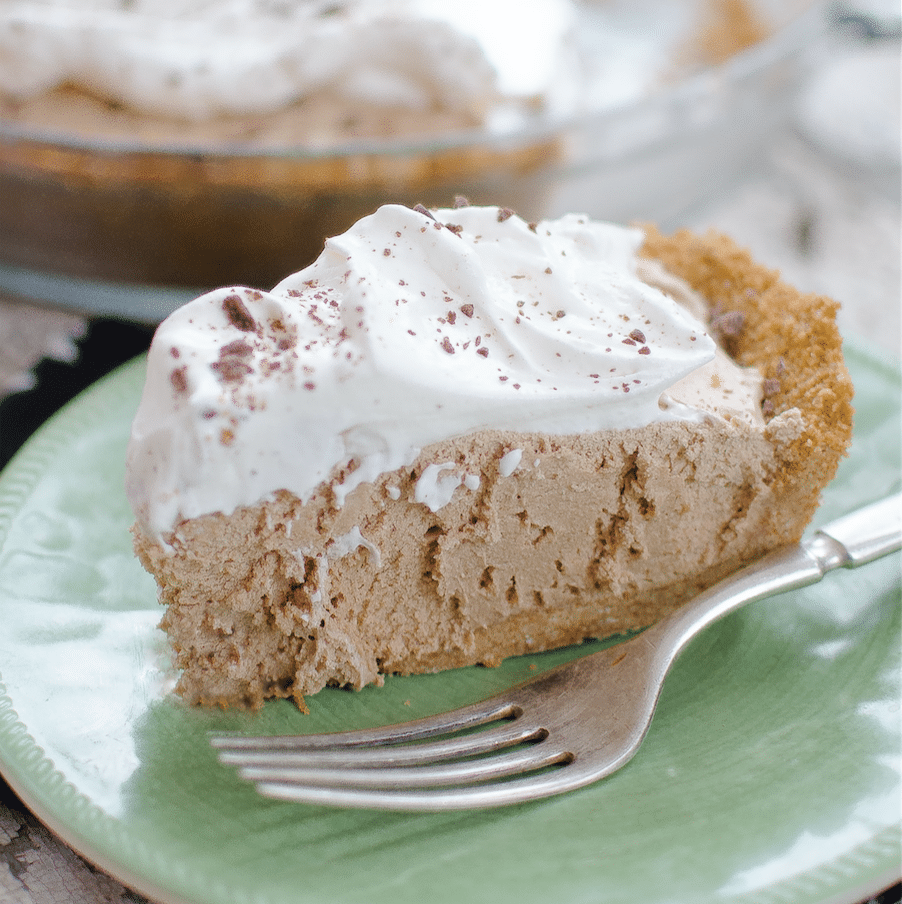 This homemade Chocolate Silk Pie recipe with freshly whipped cream is smooth & creamy, sweet & rich. It's the BEST no-bake treat for hot summer days. 