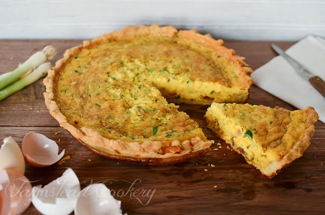 Farm Fresh Quiche Lorraine made with eggs, cream, bacon, onions, and herbs in a shortbread crust. Rich and hearty and utterly delicious!