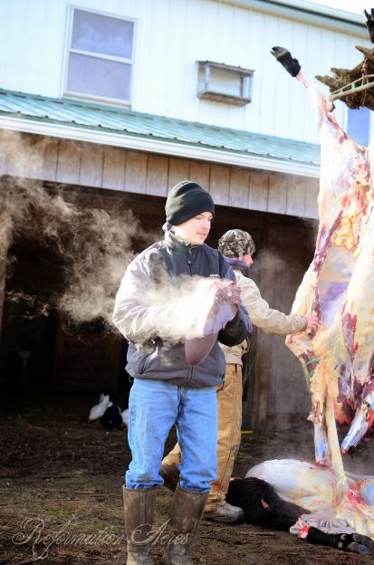 Butcher holding a hot stuff