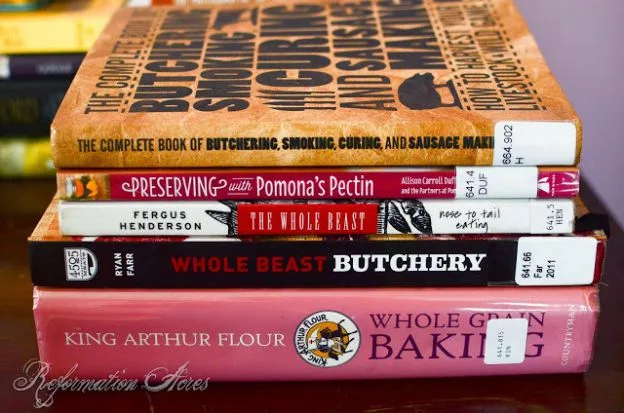 stack of homesteading books