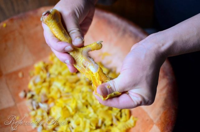 Peeling the chicken feet