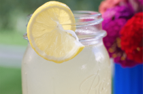 lemonade in glass jar with lemon slice Ditch the processed powdered lemonade drink and make this quick and easy real homemade lemonade recipe using fresh lemons and a few simple ingredients.