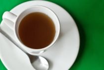 Pregnancy Tea in cup and on white plate