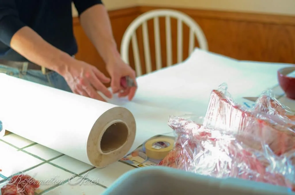 paper on table to wrap meat