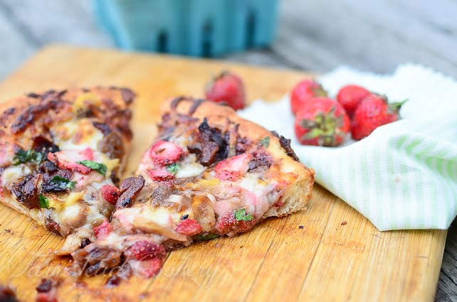 This sweet & smoky strawberry pizza features beautiful, bright red strawberries, a sprinkling of bacon as well as caramelized onions, so you know it's got to be good!