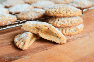 cookies on cooling rack Whole Grain Pumpkin Filled Cookies- Made with whole wheat, oatmeal, honey, and a filling that tastes like pumpkin pie!
