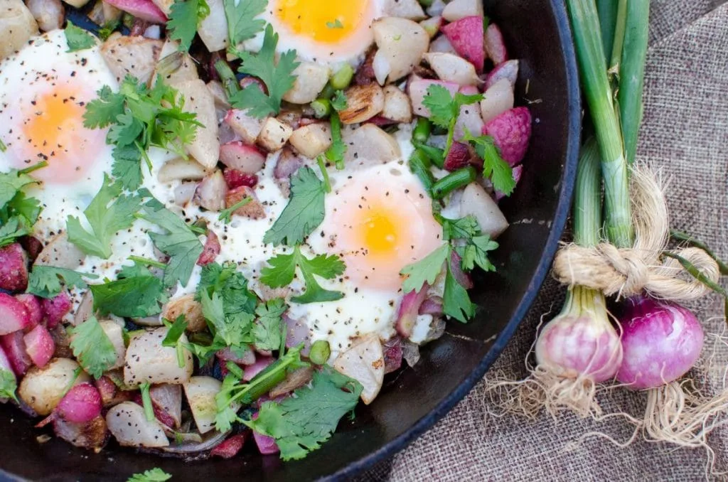 spring root hash with fried eggs (4 of 4) in cast iron skillet