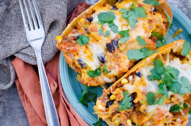 Enchilada Stuffed Spaghetti Squash spaghetti-squash-enchiladas-7-of-9 on blue plate with fork