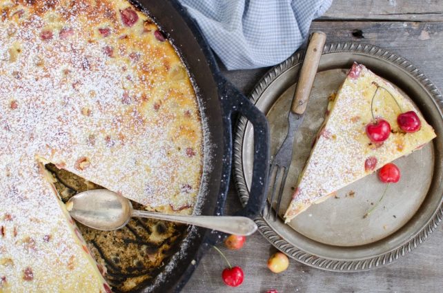 cherry clafoutis (9 of 9) on a metal plate pie piece