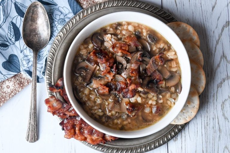 Want a warm soup to serve on a cold winter day? This recipe for Bacon Mushroom Soup with Barley & Wild Rice is ready in less than an hour but tastes like you've been slow cooking it all day! #soup #bacon