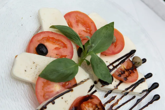 mozzarella cheese with tomato, basil, and balsamic vinegar