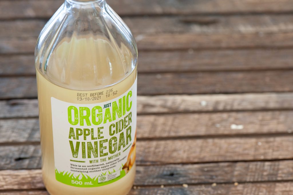A bottle of organic apple cider vinegar