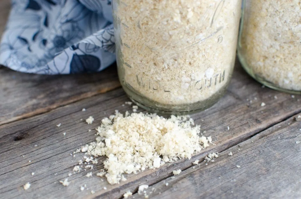 pork dust ground white crumbs on table by jar
