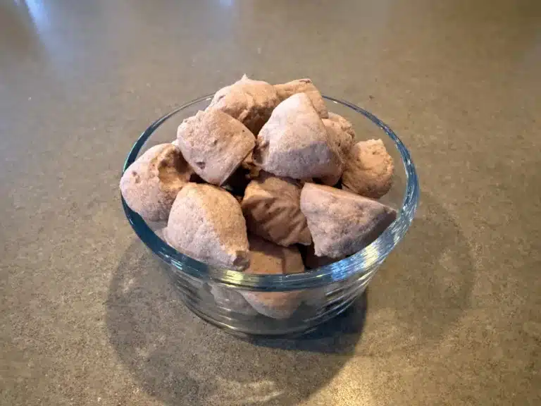 frozen chocolate protein ice cream drops in a bowl